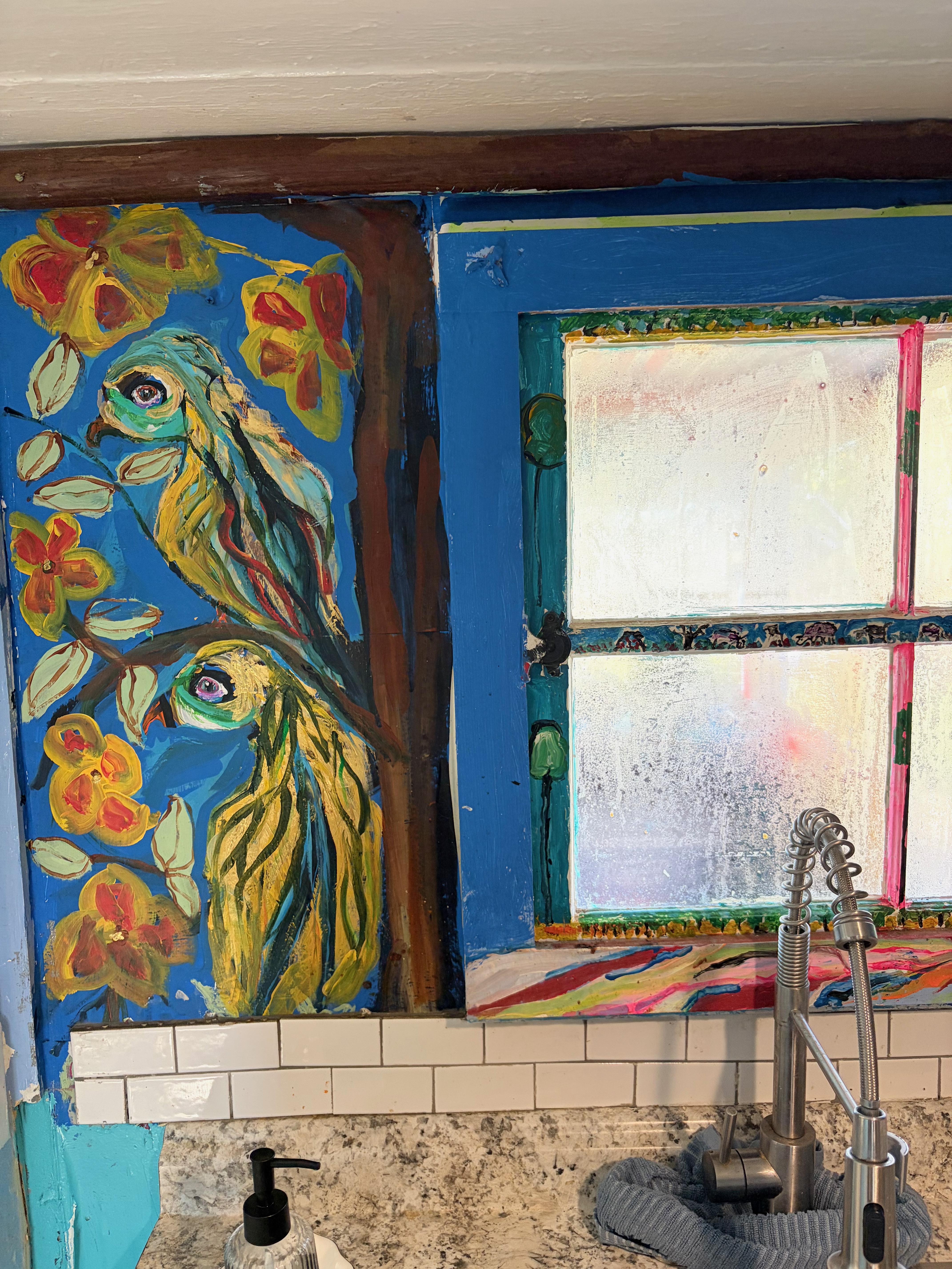 Kitchen wall with painted birds