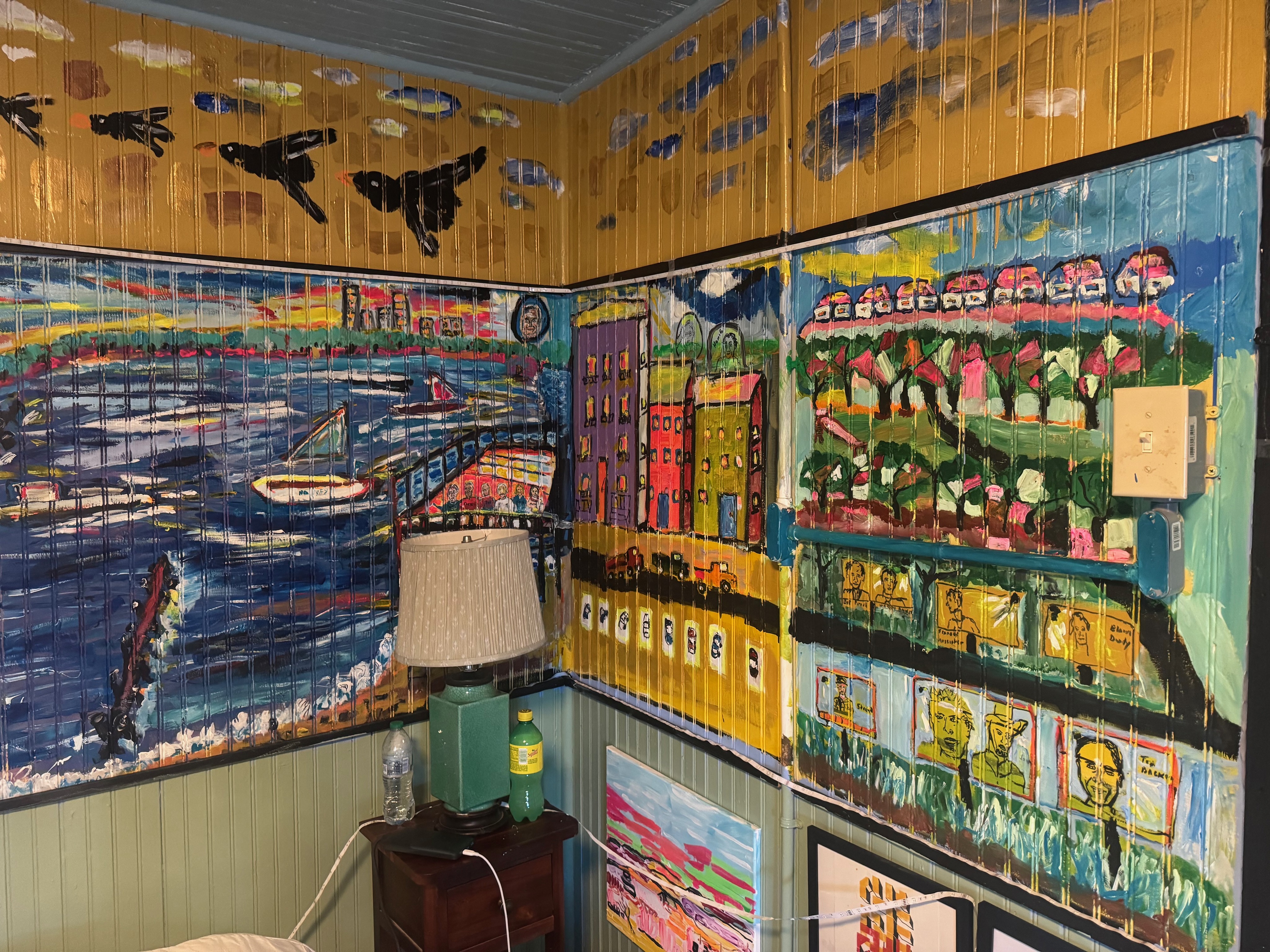 Interior corner — harbor and city murals